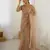 Beige net embroidered saree