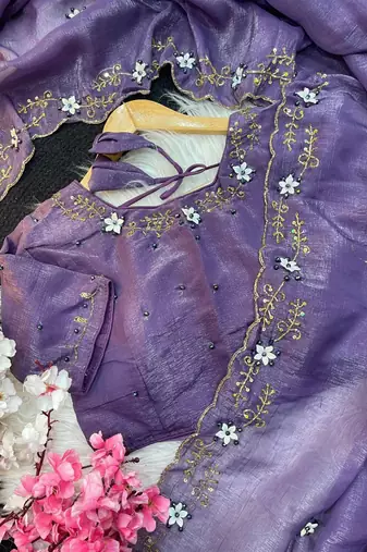 Purple Color hand khatli And cutdana butta and heavy border aarco art silk saree
