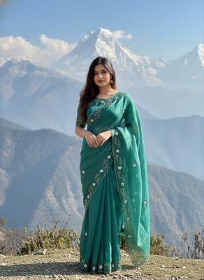Teal Color hand khatli And cutdana butta and heavy border aarco art silk saree 1