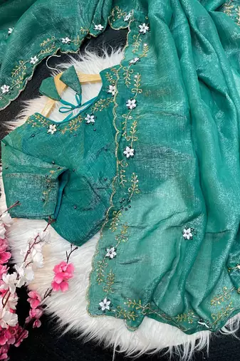 Teal Color hand khatli And cutdana butta and heavy border aarco art silk saree