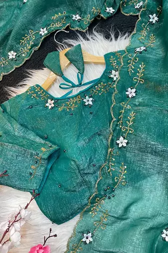 Teal Color hand khatli And cutdana butta and heavy border aarco art silk saree