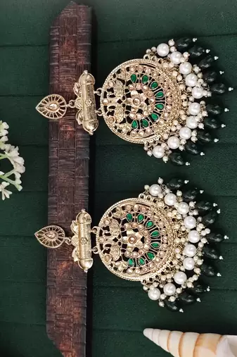 Traditional kundan green stone earrings with pearl beaded fringe design