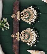 Traditional kundan green stone earrings with pearl beaded fringe design