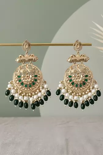 Traditional kundan green stone earrings with pearl beaded fringe design