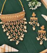 Designer antique gold finish necklace set with intricate layered patterns