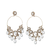 Designer gold tone hoop earrings with white pearl dangling drops