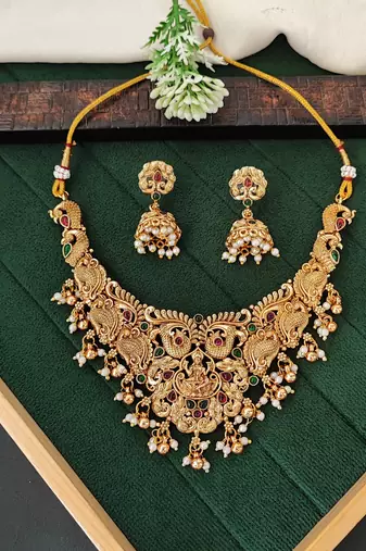 Antique lakshmi temple necklace set with peacock design and jhumka earrings for bridal wear