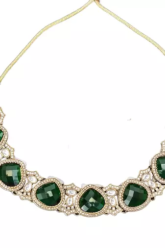 Emerald green kundan necklace set with earrings and maang tikka