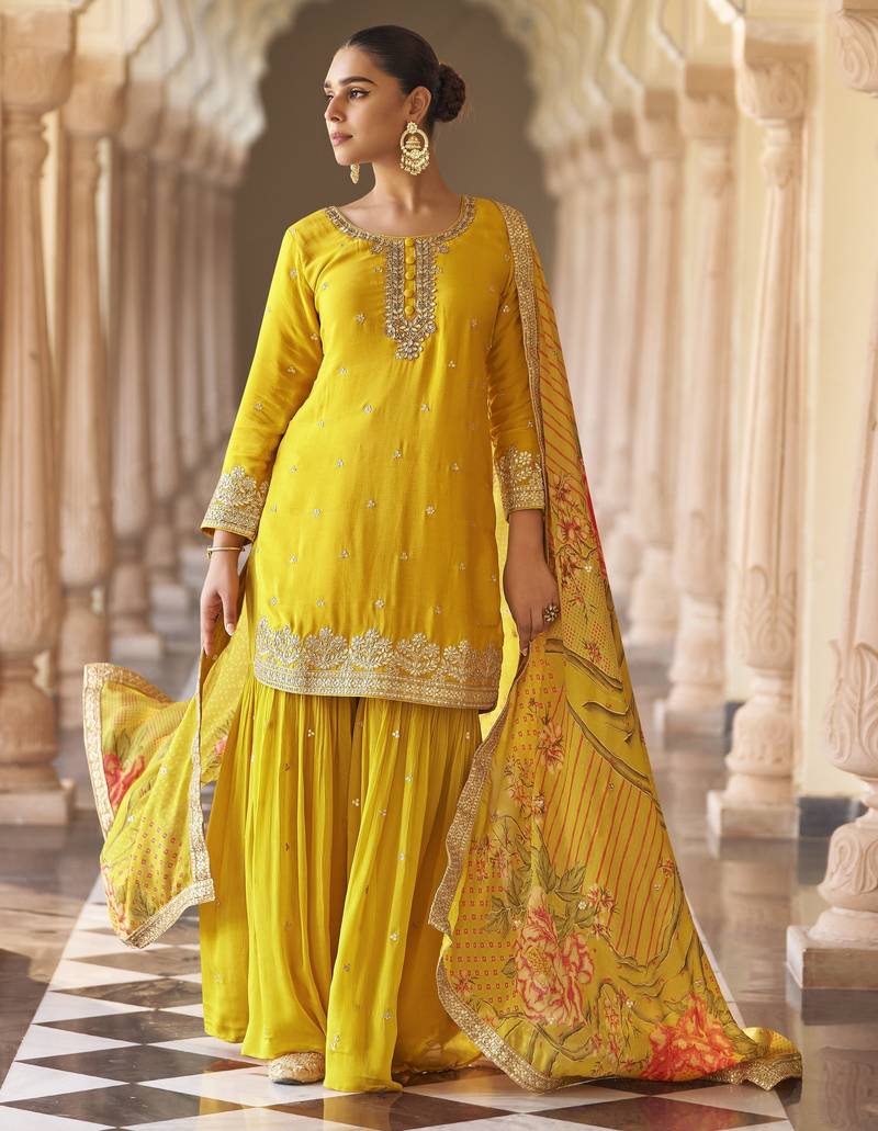 Yellow embroidered silk semi-stitch sharara suit with dupatta