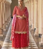 Red embroidered silk semi-stitch sharara suit with dupatta