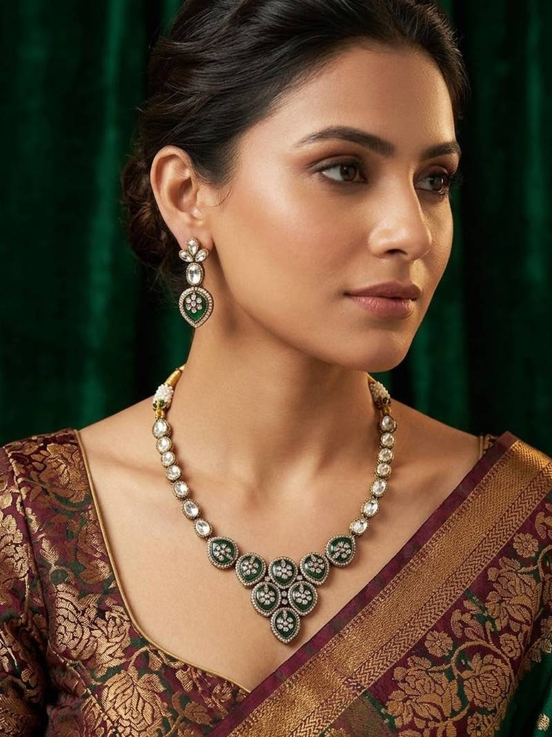 Traditional kundan & green stone necklace set with pearl accents & matching drop earrings for women
