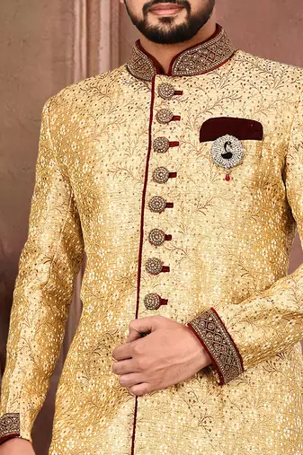 Gold straight pattern work on zari jamewar fabric with handwork