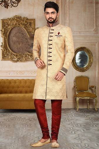 Gold straight pattern work on zari jamewar fabric with handwork