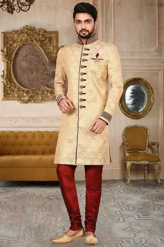 Gold straight pattern work on zari jamewar fabric with handwork