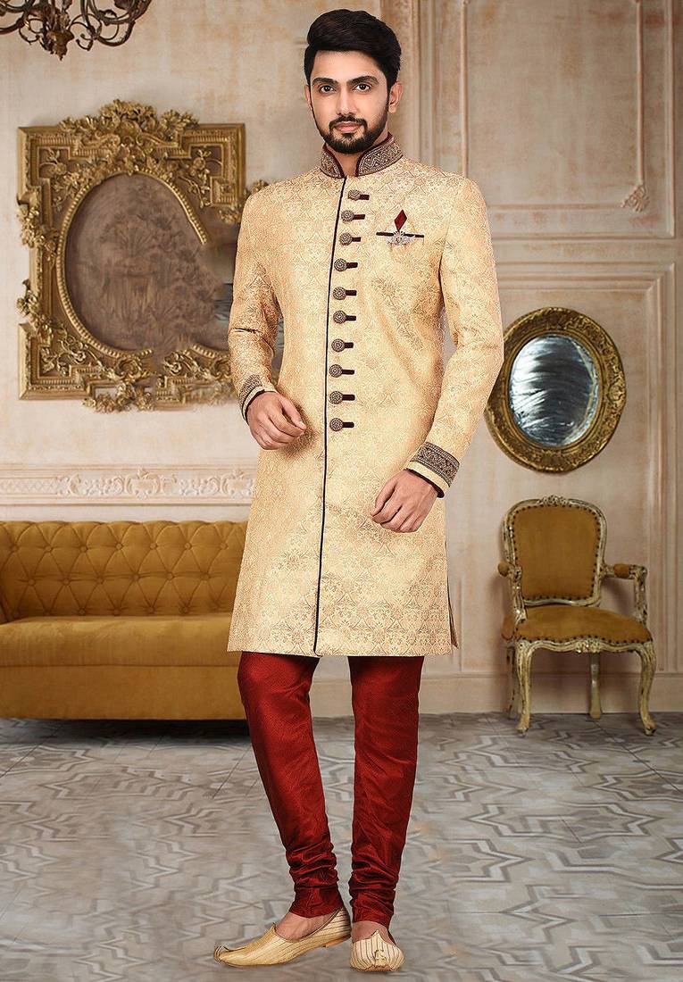 Gold straight pattern work on zari jamewar fabric with handwork