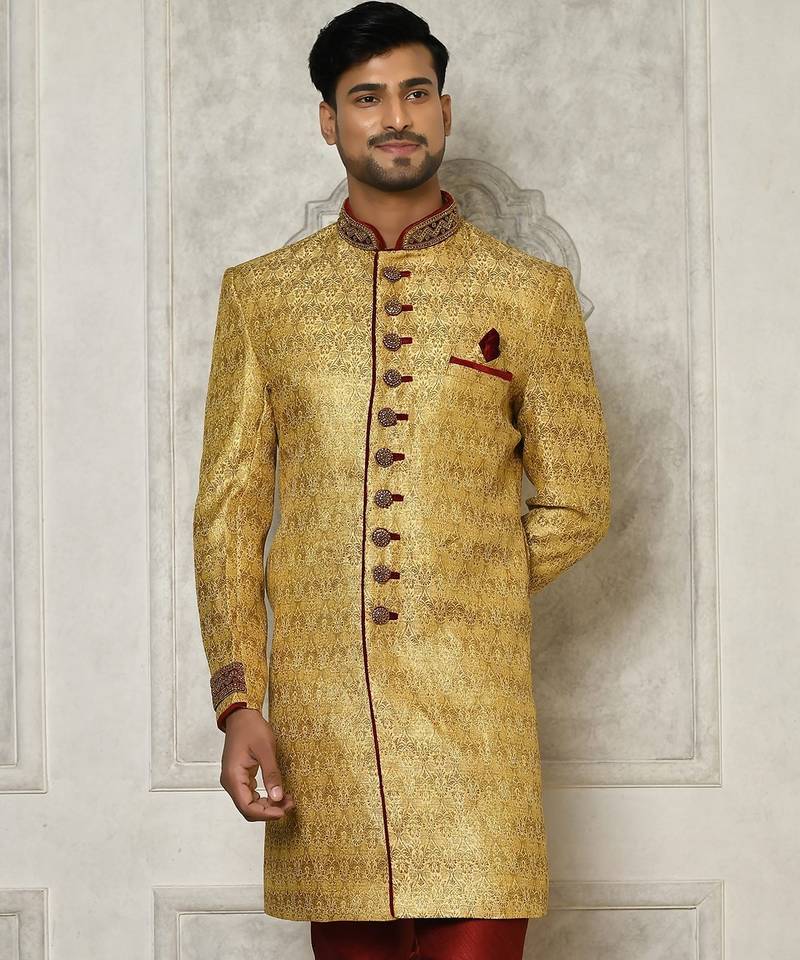Gold straight pattern work on zari jamewar fabric with handwork