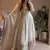 White fendy silk designer heavy work wedding wear long gown