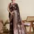 Maroon woven embellished self design satin silk blend banarasi saree with blouse