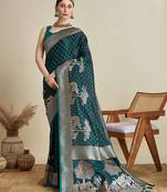 Teal green woven embellished self design satin silk blend banarasi saree with blouse