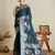 Teal blue woven embellished self design satin silk blend banarasi saree with blouse