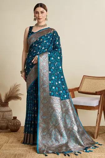Teal blue woven embellished self design satin silk blend banarasi saree with blouse