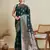 Dark green woven embellished self design satin silk blend banarasi saree with blouse
