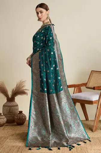 Teal green woven embellished self design satin silk blend banarasi saree with blouse