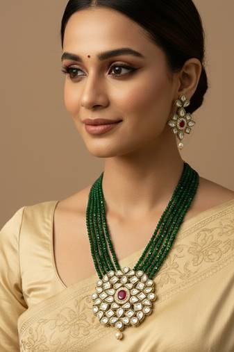 women gold plated green kundan jewellery set