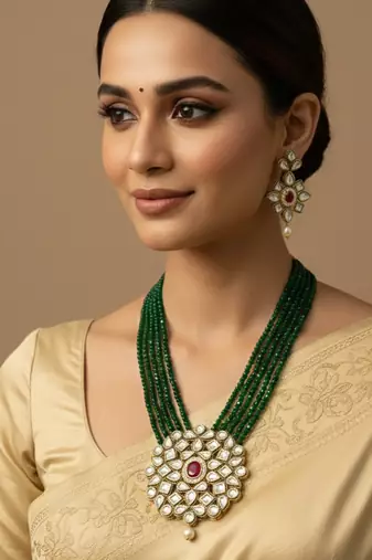  women gold plated green kundan jewellery set
