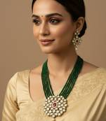  women gold plated green kundan jewellery set