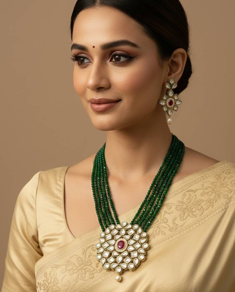  women gold plated green kundan jewellery set