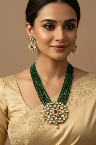  women gold plated green kundan jewellery set