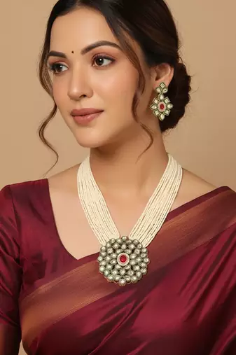  women gold plated white kundan jewellery set