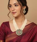  women gold plated white kundan jewellery set