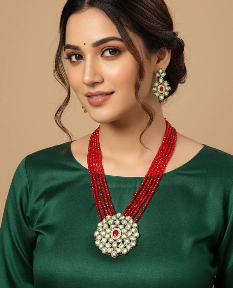  women gold plated red kundan jewellery set