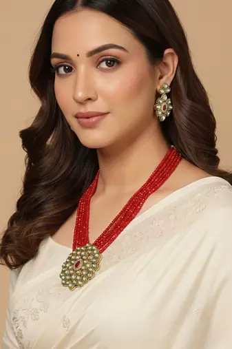  women gold plated red kundan jewellery set