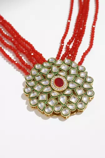  women gold plated red kundan jewellery set