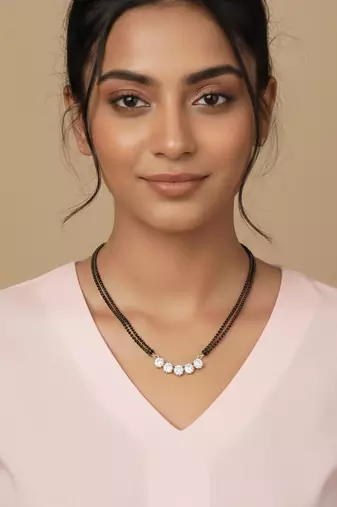  women gold plated black beaded mangalsutra