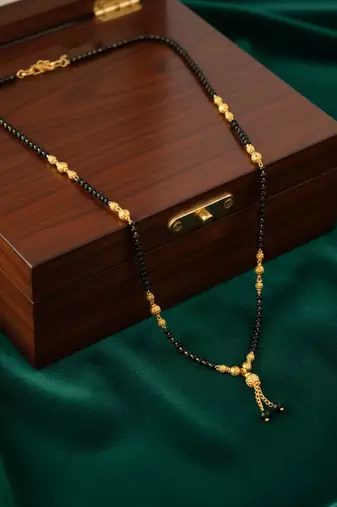  women black gold plated mangalsutra