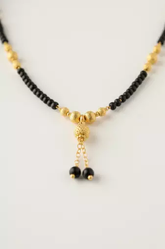  women black gold plated mangalsutra