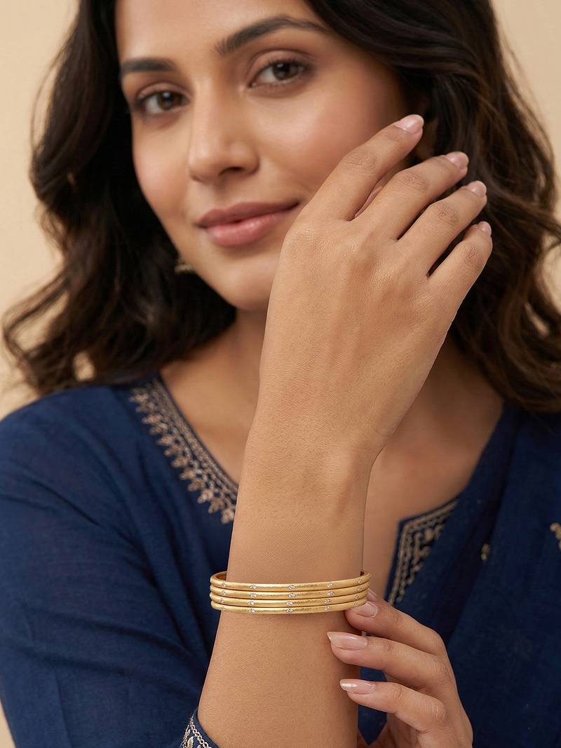  women set of 4 gold plated handcrafted cz studded bangle