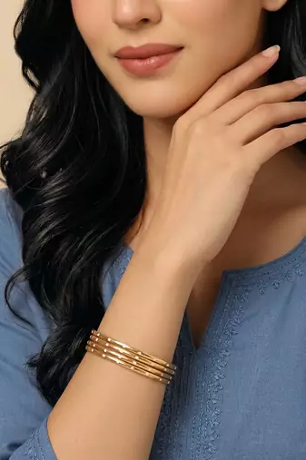  women set of 4 gold plated handcrafted cz studded bangle