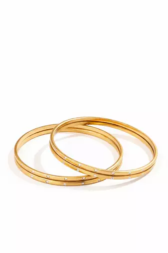  women set of 4 gold plated handcrafted cz studded bangle