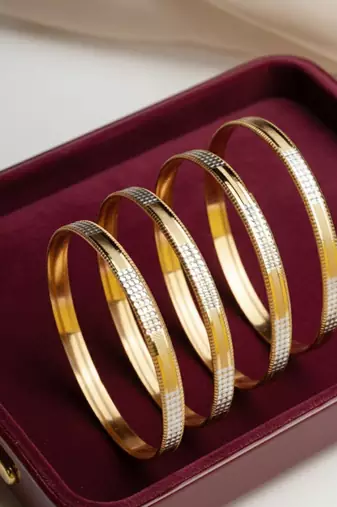  women set of 4 gold plated cz toned bangle