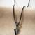  men's black arrow shaped rhodium plated pendant with chain 