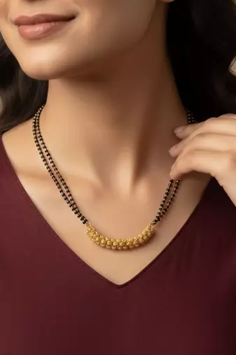  women gold plated black beaded mangalsutra