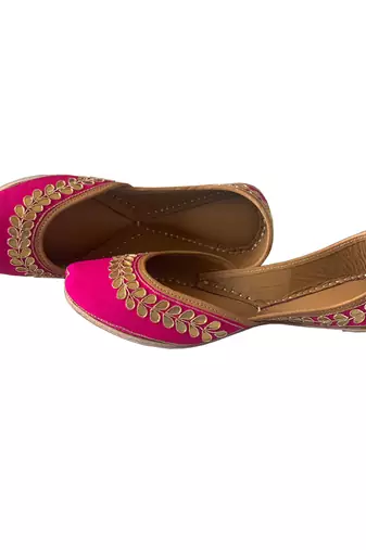 rani pink leather juttis with floral embroidered design