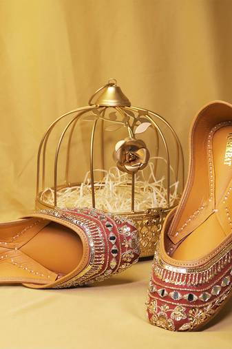 Ruby red embroidered leather juttis