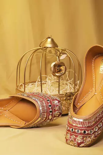 Ruby red embroidered leather juttis