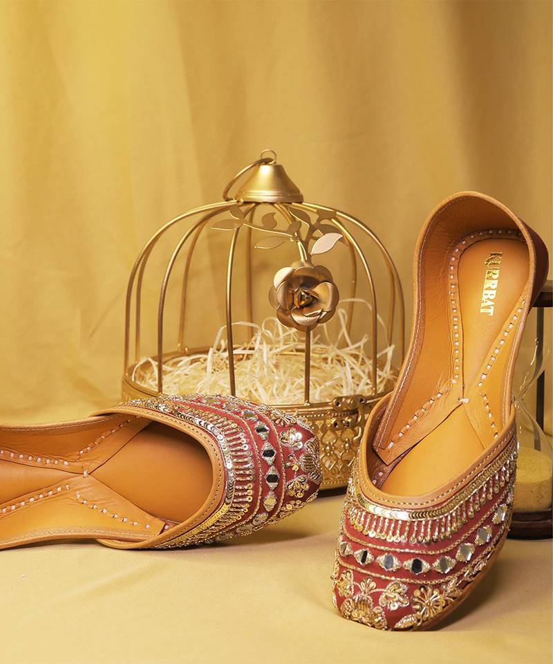 Ruby red embroidered leather juttis